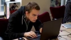 A picture of me (Luc Shelton) staring intently at the laptop computer screen during the final hours of the 48 hour game jam.