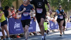 On the final stretch - A picture of myself (Luc Shelton) running the final stretch of the ASICS London 10K. I am running alongside someone who is waving.