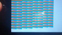 A picture of the PlayStation Portable Developer Kit, with a very buggy rendering from one of the earlier versions of the application.